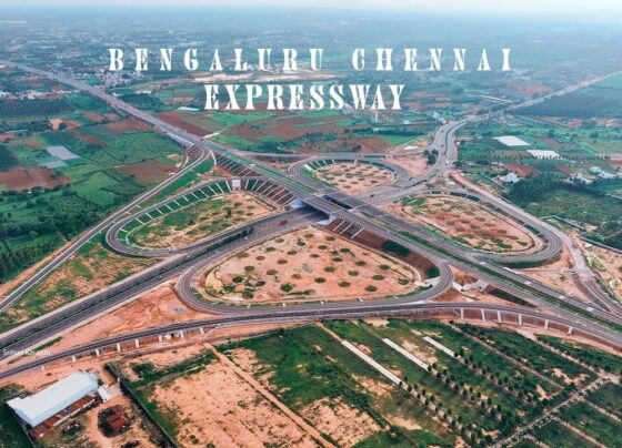 Bengaluru-Chennai Expressway: Revolutionizing Travel and Connectivity The Bengaluru-Chennai Greenfield Expressway is poised to transform the connectivity and economic landscape between these two major cities. Spearheaded by the Union Road Transport Ministry, this ambitious project will significantly reduce travel time and fuel consumption, enhancing regional development and industrial growth. Significance of the Bengaluru-Chennai Expressway The newly constructed Bengaluru-Chennai expressway is ready for inauguration, as confirmed by Union Road Transport Minister Nitin Gadkari. This state-of-the-art national highway, built at a cost of ₹17,930 crores, is expected to be fully operational by the end of this year. With this expressway, the travel time between Bengaluru and Chennai will be slashed to just five hours, a significant improvement over the previous travel duration. Key Features and Construction Phases The expressway spans 262 kilometers, with 110 kilometers falling within Karnataka, while the remainder traverses Andhra Pradesh and enters Tamil Nadu. This four-lane highway will facilitate seamless travel and support the development of industrial corridors along its route. Phase One: Hoskote to Bethamangala The first phase covers a distance of 62.6 kilometers, connecting Hoskote in Bengaluru to Bethamangala in Karnataka. This stretch will feature advanced road infrastructure to ensure smooth and efficient transportation. Phase Two: Bethamangala to Gudipala The second phase extends over 85 kilometers from Bethamangala to Gudipala in Andhra Pradesh. This segment is crucial for integrating regional connectivity and boosting economic activities along the route. Phase Three: Gudipala to Sriperumbudur The final phase spans 106 kilometers, connecting Gudipala to Sriperumbudur in Tamil Nadu. This stretch will further enhance connectivity to Chennai, promoting industrial growth and regional development. Industrial Development Along the Expressway The expressway will foster the development of industrial zones along its route. Significant areas such as Narsapura, Kolar, Mulbagal, and Tamaka have already witnessed industrial growth, thanks to the enhanced transportation infrastructure. These zones are expected to thrive further, attracting investments and generating employment opportunities. Strategic Connectivity and Infrastructure Enhancements The expressway is designed to ensure vehicles can travel uninterrupted, thanks to strategically placed ring roads and flyovers. These include connections from Hoskote to Devanahalli, Hosur, and Tumkur, among others. The infrastructure development extends to direct routes from industrial areas to Kempegowda International Airport, facilitating efficient transportation of goods and passengers. Environmental and Economic Benefits