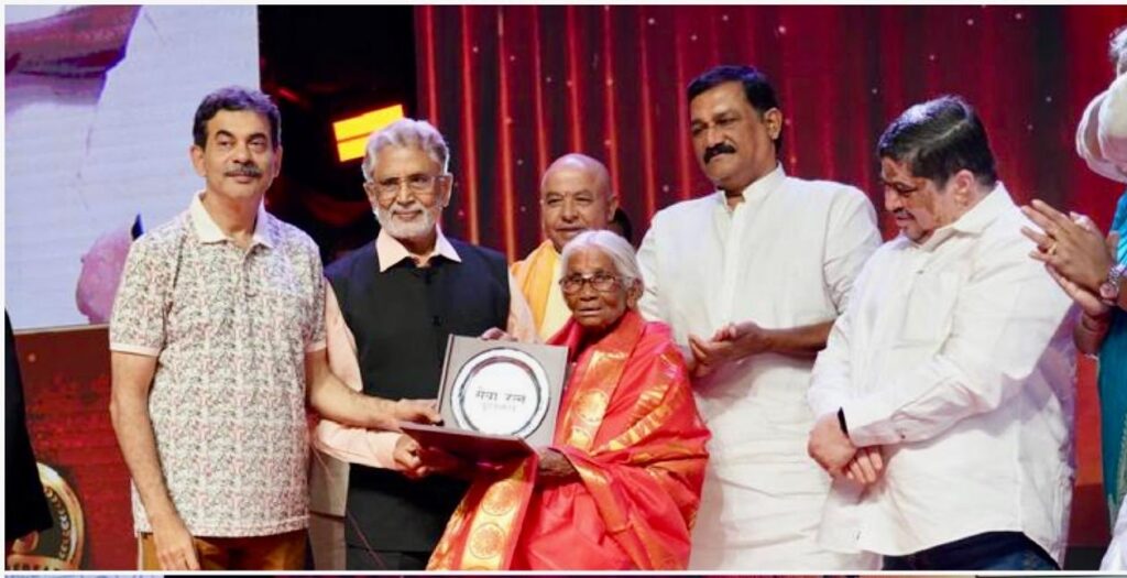 Met an amazing Kamlathal garu while presenting the @Kalamandir_FN Seva Ratna awards. She is 84 yrs old from Coimbatore. For last 35 years, she is making & selling Idlis to needy for just 1 ₹. Sells 600 sets daily for 600 ₹, and saves 100 ₹, enough for her needs. Deep respects Meeting Kamlathal Garu: The Inspirational Idli Amma of Coimbatore Introduction In the bustling city of Coimbatore, Tamil Nadu, lives an extraordinary woman known to many as Idli Amma. Kamlathal Garu, an 84-year-old woman, has been making and selling idlis for just 1 ₹ for the last 35 years. Her story is one of compassion, dedication, and an unwavering spirit to serve the needy. This article delves into the life of Kamlathal Garu, her impact on the community, and the recognition she has received through the Kalamandir_FN Seva Ratna awards. Historical Context Early Life of Kamlathal Garu Kamlathal Garu’s journey began in a humble village near Coimbatore. Born into a modest family, she learned the art of making idlis from her mother. Little did she know that this skill would one day become her tool to serve and uplift her community. Beginnings of Idli Business Thirty-five years ago, Kamlathal Garu decided to sell idlis to support her family. She noticed the financial struggles of the daily wage laborers in her neighborhood and resolved to sell her idlis at an affordable price of just 1 ₹. This decision was not driven by profit but by a deep sense of empathy and community service. The Philosophy Behind 1 ₹ Idlis Commitment to Affordability Kamlathal Garu’s commitment to selling idlis at 1 ₹ stems from her understanding of the economic hardships faced by many. By keeping the price low, she ensures that even the poorest individuals can afford a nutritious meal. Simplicity and Sustainability Her business model is simple and sustainable. Every day, she makes 600 idlis, selling them all for 600 ₹ and saving 100 ₹ for her needs. This modest income is sufficient for her, demonstrating that sometimes, less is more. Impact on the Community Feeding the Needy Kamlathal Garu’s idlis have become a lifeline for many daily wage earners and underprivileged individuals in Coimbatore. Her consistent and affordable meals ensure that they do not go hungry, fostering a sense of security and community welfare. Creating a Sense of Belonging Her small idli stall has become a place where people from various walks of life gather, creating a sense of belonging and community spirit. Her kindness and dedication have made her a beloved figure in Coimbatore. Recognition and Awards Kalamandir_FN Seva Ratna Awards Kamlathal Garu’s selfless service was recognized through the prestigious Kalamandir_FN Seva Ratna awards. This honor celebrates individuals who have made significant contributions to society through their selfless service and dedication. Media Attention and Public Support Her story has garnered media attention and public support, highlighting the importance of community service and inspiring others to follow her example. Challenges and Resilience Overcoming Financial Constraints Despite the financial constraints, Kamlathal Garu has never wavered in her commitment to serving affordable meals. Her resilience in the face of economic challenges is truly commendable. Physical Demands At 84 years old, the physical demands of making and selling 600 idlis daily are significant. Yet, she continues to work tirelessly, driven by her unwavering dedication to her mission. Community Support Local Donations and Contributions The local community has rallied around Kamlathal Garu, providing donations and support to ensure she can continue her work. This collective effort underscores the power of community solidarity. Volunteers and Helpers Over the years, volunteers and helpers have stepped forward to assist her, ensuring that the idlis reach those who need them the most. Their involvement amplifies the impact of her efforts. The Legacy of Idli Amma Inspiring Future Generations Kamlathal Garu’s story is a powerful example of how one individual’s dedication can make a significant impact. Her legacy inspires future generations to engage in community service and prioritize the welfare of others. A Model of Selflessness Her life serves as a model of selflessness and compassion, reminding us all of the importance of giving back to the community. Conclusion Kamlathal Garu, the Idli Amma of Coimbatore, exemplifies the profound impact one person can have through simple acts of kindness and dedication. Her 35-year commitment to selling idlis at 1 ₹ has not only fed the needy but also fostered a sense of community and inspired countless others. Her recognition through the Kalamandir_FN Seva Ratna awards is a testament to her extraordinary contributions. As we reflect on her journey, let us be inspired to serve our communities with the same compassion and dedication.