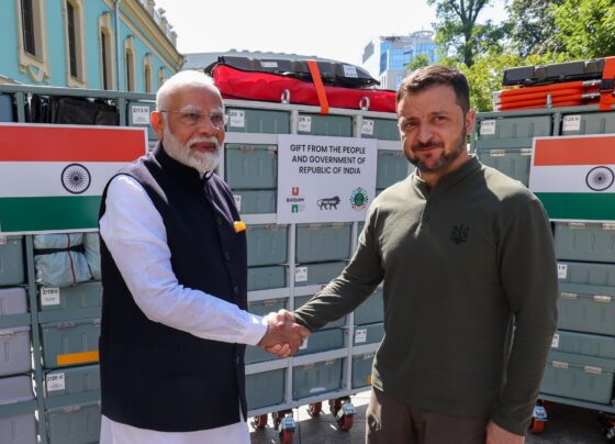 Narendra Modi's Bharat Health Initiative for Sahyog Hita & Maitri (BHISHM): A Game-Changer in Global Medical Aid India's Prime Minister, Narendra Modi, has unveiled a groundbreaking initiative known as the Bharat Health Initiative for Sahyog Hita & Maitri (BHISHM). This innovative program is designed to ensure the rapid deployment of medical facilities and aid on a global scale. The initiative, highlighted by its use of modular "BHISHM cubes," promises to revolutionize the way medical care is delivered in times of need. BHISHM: A New Paradigm in Medical Aid The BHISHM initiative is a unique approach that addresses the challenges of providing medical care in emergency situations. At its core are the BHISHM cubes—compact, modular units that contain essential medicines and medical equipment. These cubes are designed for easy transport and swift deployment, making them an invaluable asset in crisis situations, whether due to natural disasters, pandemics, or conflicts. The Structure and Purpose of BHISHM Cubes Each BHISHM cube is meticulously organized to include a wide range of medical supplies tailored to various emergencies. These cubes are not just about providing basic first aid; they are equipped with advanced medical tools, life-saving drugs, and other critical healthcare resources. The versatility of these cubes allows them to be used in diverse scenarios, from field hospitals in war zones to rural clinics in disaster-stricken areas. The design of the cubes ensures that they can be deployed rapidly, even in the most challenging conditions. Whether it's an earthquake in a remote region or a sudden outbreak of disease in an urban area, BHISHM cubes can be quickly mobilized to provide immediate relief. A Symbol of Global Solidarity Narendra Modi's presentation of BHISHM cubes to Ukrainian President Volodymyr Zelenskyy is a powerful symbol of India's commitment to global solidarity. This gesture underscores the initiative's broader goal: to foster international cooperation in health care. By sharing these resources with Ukraine, India is not only providing essential medical aid but also strengthening diplomatic ties and mutual support between the two nations. The Global Impact of BHISHM The BHISHM initiative is poised to have a significant impact on global health. With its ability to be deployed anywhere in the world, it offers a solution to some of the most pressing healthcare challenges faced by many countries. The initiative aligns with global health goals, particularly in terms of improving access to quality medical care in underserved regions. Moreover, BHISHM reflects India's growing role as a leader in global health. By offering this innovative solution to the world, India is positioning itself as a key player in international humanitarian efforts. Future Prospects of BHISHM Looking ahead, the success of the BHISHM initiative could pave the way for further innovations in global health care. As more countries adopt similar strategies, we could see a new era of collaboration and shared resources in the face of global health challenges. The initiative also opens up possibilities for further enhancements, such as integrating new technologies into the cubes or expanding the range of medical supplies they carry. Conclusion: A Vision for a Healthier World Narendra Modi's Bharat Health Initiative for Sahyog Hita & Maitri (BHISHM) represents a visionary approach to addressing global health challenges. By focusing on rapid deployment, versatility, and international cooperation, the initiative has the potential to save lives and improve health outcomes around the world. The presentation of BHISHM cubes to President Zelenskyy is just the beginning of what could be a transformative journey in global health care, driven by innovation, compassion, and a commitment to a healthier future for all.