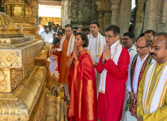 Justice DY Chandrachud, the Chief Justice of India (CJI), recently visited the revered Tirumala Srivari Temple, a holy site dedicated to Lord Sri Venkateswara, for a special darshan. Accompanied by his family, Justice Chandrachud participated in the religious rituals and sought the blessings of the deity in the temple's sanctum sanctorum. Warm Welcome at Vaikuntha Queue Complex Upon his arrival at the Vaikuntha queue complex, Justice Chandrachud was greeted by the Executive Officer (EO) of the Tirumala Tirupati Devasthanams (TTD), J. Shyamala Rao. The TTD management ensured a smooth and respectful visit for the CJI and his family, as they proceeded through the special queue reserved for dignitaries and officials. Darshan at the Sanctum Sanctorum After making his way through the sacred corridors of the ancient hill shrine, Justice Chandrachud entered the sanctum sanctorum, where he offered prayers to Lord Venkateswara. This moment of spiritual connection is deeply meaningful for millions of devotees who visit Tirumala every year, as the sanctum holds the deity’s most revered idol. Blessings at Ranganayakula Mandapam Post-darshan, the Chief Justice and his family received blessings at the Ranganayakula Mandapam. The temple priests performed special rituals and bestowed traditional blessings on the family. This ceremony, an integral part of the Tirumala temple experience, is reserved for distinguished visitors and allows them to receive personalized prayers and offerings. TTD's Gift of Honor to Justice Chandrachud In a gesture of respect and reverence, the TTD EO, J. Shyamala Rao, presented Justice Chandrachud with the temple's sacred thirtha prasadam, a religious offering, and a portrait of Lord Venkateswara. The thirtha prasadam holds immense spiritual significance, believed to carry the blessings of the deity to those who receive it. A Spiritual Visit for the Nation's Top Jurist The visit of the Chief Justice of India to one of the most prominent pilgrimage centers in the world underscores the deep spiritual connection that many in India, including those in the highest offices, maintain with their faith. The Tirumala temple, known for its historical and religious significance, is a place where devotees seek divine intervention and blessings for personal and professional success. Significance of Tirumala for Devotees Tirumala, located in the hills of Andhra Pradesh, is one of the most visited pilgrimage sites globally, drawing millions of visitors each year. Lord Venkateswara, also known as Balaji, is the primary deity worshipped here, and the temple is known for its rich history and deeply ingrained cultural significance. Devotees from all walks of life, including prominent figures like Justice Chandrachud, visit this temple seeking peace, guidance, and blessings. Conclusion Justice DY Chandrachud's visit to the Tirumala Srivari Temple serves as a reminder of the enduring influence of spirituality and religion in India, even among the country’s highest-ranking officials. His darshan and the rituals performed at the temple reflect the deep-rooted tradition of seeking divine intervention and blessings in moments of personal and professional significance. The gesture of receiving thirtha prasadam and a deity portrait from the TTD further highlights the sacred connection between the Chief Justice and the temple, symbolizing respect, honor, and devotion.