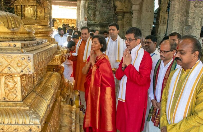 Justice DY Chandrachud, the Chief Justice of India (CJI), recently visited the revered Tirumala Srivari Temple, a holy site dedicated to Lord Sri Venkateswara, for a special darshan. Accompanied by his family, Justice Chandrachud participated in the religious rituals and sought the blessings of the deity in the temple's sanctum sanctorum. Warm Welcome at Vaikuntha Queue Complex Upon his arrival at the Vaikuntha queue complex, Justice Chandrachud was greeted by the Executive Officer (EO) of the Tirumala Tirupati Devasthanams (TTD), J. Shyamala Rao. The TTD management ensured a smooth and respectful visit for the CJI and his family, as they proceeded through the special queue reserved for dignitaries and officials. Darshan at the Sanctum Sanctorum After making his way through the sacred corridors of the ancient hill shrine, Justice Chandrachud entered the sanctum sanctorum, where he offered prayers to Lord Venkateswara. This moment of spiritual connection is deeply meaningful for millions of devotees who visit Tirumala every year, as the sanctum holds the deity’s most revered idol. Blessings at Ranganayakula Mandapam Post-darshan, the Chief Justice and his family received blessings at the Ranganayakula Mandapam. The temple priests performed special rituals and bestowed traditional blessings on the family. This ceremony, an integral part of the Tirumala temple experience, is reserved for distinguished visitors and allows them to receive personalized prayers and offerings. TTD's Gift of Honor to Justice Chandrachud In a gesture of respect and reverence, the TTD EO, J. Shyamala Rao, presented Justice Chandrachud with the temple's sacred thirtha prasadam, a religious offering, and a portrait of Lord Venkateswara. The thirtha prasadam holds immense spiritual significance, believed to carry the blessings of the deity to those who receive it. A Spiritual Visit for the Nation's Top Jurist The visit of the Chief Justice of India to one of the most prominent pilgrimage centers in the world underscores the deep spiritual connection that many in India, including those in the highest offices, maintain with their faith. The Tirumala temple, known for its historical and religious significance, is a place where devotees seek divine intervention and blessings for personal and professional success. Significance of Tirumala for Devotees Tirumala, located in the hills of Andhra Pradesh, is one of the most visited pilgrimage sites globally, drawing millions of visitors each year. Lord Venkateswara, also known as Balaji, is the primary deity worshipped here, and the temple is known for its rich history and deeply ingrained cultural significance. Devotees from all walks of life, including prominent figures like Justice Chandrachud, visit this temple seeking peace, guidance, and blessings. Conclusion Justice DY Chandrachud's visit to the Tirumala Srivari Temple serves as a reminder of the enduring influence of spirituality and religion in India, even among the country’s highest-ranking officials. His darshan and the rituals performed at the temple reflect the deep-rooted tradition of seeking divine intervention and blessings in moments of personal and professional significance. The gesture of receiving thirtha prasadam and a deity portrait from the TTD further highlights the sacred connection between the Chief Justice and the temple, symbolizing respect, honor, and devotion.