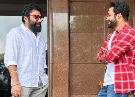 Jr NTR and Sandeep Reddy Vanga: Possible Collaboration Sparks Buzz in the Film Industry Jr NTR and Sandeep Reddy Vanga, two powerful names in Indian cinema, have fueled rumors of an exciting new project together after being spotted together recently. The viral image of the "Devara" star and the "Animal" director has led to wide speculation that the two may be collaborating on a future film, sending fans into a frenzy. This article delves into the details of their meeting, upcoming projects, and the buzz surrounding their possible partnership. Jr NTR Gears Up for "Devara" Release Telugu superstar Jr NTR is currently in the spotlight for his upcoming film "Devara." As the release of the highly anticipated trailer draws near, excitement is building among fans and movie enthusiasts alike. "Devara" marks Jr NTR’s first major release since the blockbuster hit "RRR," which brought him immense international recognition. Starring alongside Janhvi Kapoor and Saif Ali Khan, Jr NTR is poised to deliver another captivating performance in this action-packed film. The photo that has gone viral shows Jr NTR in a laid-back, casual outfit, wearing jeans paired with a grey t-shirt and a checkered shirt. His relaxed appearance reflects the casual nature of his meeting with Sandeep Reddy Vanga, further fueling curiosity about what the two discussed. Sandeep Reddy Vanga’s Growing Influence in Cinema Sandeep Reddy Vanga, best known for directing the blockbuster films "Arjun Reddy" and "Kabir Singh," continues to rise in stature in the film industry. After the success of these films, Vanga has now set his sights on his upcoming project, "Spirit," starring Prabhas. The director is also fresh off the release of "Animal," which stars Ranbir Kapoor and has garnered significant attention from audiences. The viral photo of Jr NTR and Sandeep together has sparked speculation about a potential collaboration between the two. Fans are eagerly hoping to see the dynamic combination of Jr NTR’s powerful acting and Vanga’s intense directorial style come to life on the big screen. The Viral Meeting: What Could This Mean? The buzz began when a source revealed to Pinkvilla that the duo met in Mumbai, sparking immediate rumors. “It was a casual meeting where the two discussed their craft, upcoming films, and the possibility of working together in the future. Both Vanga and NTR have a deep respect for each other’s work, and the idea of teaming up on something big and special is definitely on the table,” the source said. With Sandeep Reddy Vanga expressing his excitement for Jr NTR’s upcoming film "Devara," and Jr NTR showing interest in Vanga’s directorial projects, it seems only natural that a collaboration could be on the horizon. Fans are now keeping their eyes peeled for any official announcements regarding this much-anticipated pairing. Sandeep Reddy Vanga’s Upcoming Projects As Sandeep Reddy Vanga gears up for his upcoming project "Spirit," which stars Prabhas in the lead role, he remains one of the most sought-after directors in the Indian film industry. "Spirit" is expected to be a high-octane film that will showcase Vanga’s distinctive directorial style. In addition to "Spirit," Vanga has already teased a sequel to his latest hit "Animal." The announcement of "Animal Park," the next installment in the series, has left fans eagerly anticipating more details. With his hands full of exciting projects, it remains to be seen if Vanga will soon add a collaboration with Jr NTR to his busy schedule. Jr NTR’s Expanding Career: From "Devara" to "War 2" Beyond "Devara," Jr NTR’s career is on a remarkable upward trajectory. His next major project is "War 2," a film that has already garnered significant attention due to its stellar cast. Jr NTR will play a negative role in the film, marking his first time portraying a villain. The film also stars Bollywood heavyweight Hrithik Roshan, and rumors suggest that Kiara Advani will take on the female lead. This film is expected to be a game-changer for Jr NTR as he explores new dimensions of his acting range. With a line-up of blockbuster films like "Devara" and "War 2," Jr NTR is proving himself to be one of the most versatile actors in Indian cinema today. Fans are eagerly awaiting both films, and the potential collaboration with Sandeep Reddy Vanga could only add more excitement to his impressive slate of upcoming projects. Industry Buzz: Jr NTR and Sandeep Reddy Vanga’s Future Together While no official confirmation has been made about a project between Jr NTR and Sandeep Reddy Vanga, the film industry is buzzing with excitement over the possibility. Both stars have a track record of delivering highly successful films that leave a lasting impact on audiences. A collaboration between the two would likely result in a project of epic proportions, blending Jr NTR’s commanding screen presence with Vanga’s bold and unapologetic filmmaking style. Fans are eagerly awaiting any news regarding this potential team-up, and the viral photo has only added to the growing speculation. If the collaboration comes to fruition, it could be one of the most anticipated films in the Indian film industry. Conclusion: A Collaboration Worth Waiting For In the world of cinema, when two powerhouse talents like Jr NTR and Sandeep Reddy Vanga meet, sparks are bound to fly. While the viral photo has sparked rumors and fan theories, only time will tell if the duo will officially collaborate on a project. With both Jr NTR’s "Devara" and Sandeep Reddy Vanga’s "Spirit" releasing soon, fans have plenty to look forward to in the near future. One thing is certain: if these two decide to join forces, it will undoubtedly result in a film that will captivate audiences and make headlines across the industry. Fans and critics alike are keeping a close eye on what could be the next big collaboration in Indian cinema.