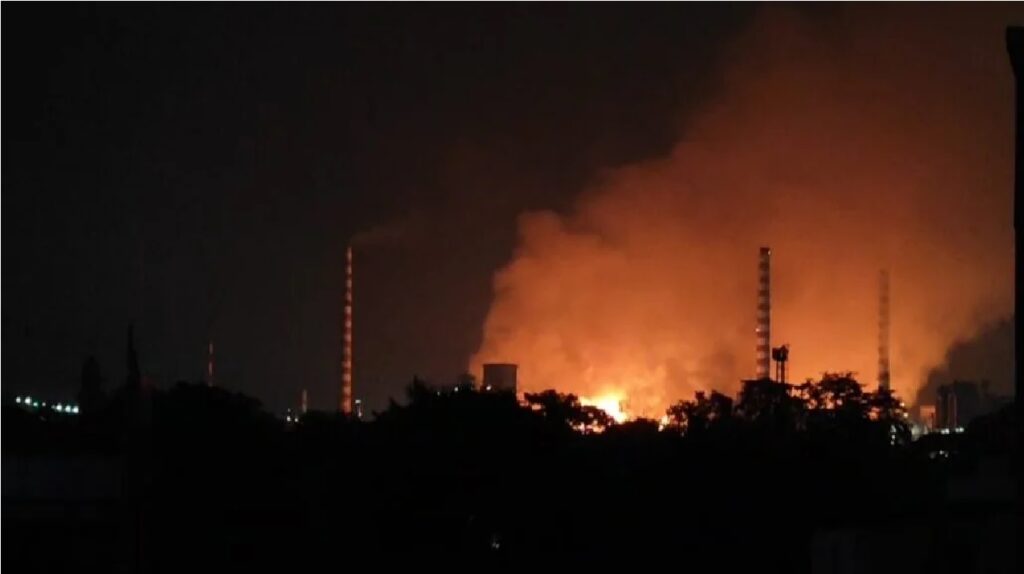 A recent fire at Tata Steel’s Jamshedpur plant triggered a citywide blackout, leaving residents in panic. Images and videos of the incident spread rapidly across social media, sparking rumors of a massive blast. While the city struggled with widespread power outages, the real cause of the blackout stems from an incident at the steel plant that, though significant, has been officially clarified as not life-threatening. Cause of the Blackout in Jamshedpur The blackout engulfed all areas of Jamshedpur, and residents quickly took to social platforms, such as WhatsApp, to share alarming visuals of the blaze. Eyewitnesses reported seeing sparks from Battery No. 8 and 9 of the Tata Steel plant. Following the explosion, power supply to the city was cut off, throwing several parts, including critical infrastructure like hospitals, into darkness. Despite the concerns raised online, Tata Steel was quick to reassure the public. They confirmed that no major accident had occurred at their blast furnaces. Instead, the fire resulted from a routine safety procedure. The company explained that the visible flames were part of the regulated release of gas, adhering to government safety protocols. These measures are designed to ensure that any excess gas is safely burned before being released into the atmosphere. Clarification from Tata Steel Tata Steel has firmly stated that no significant accidents or hazardous explosions took place within the plant. The release of gas, which generated the flames, is part of a standard safety protocol. This safety measure involves burning off gas as required by government regulations. However, the sudden appearance of the flames led many to believe that a catastrophic event had occurred, prompting widespread speculation and misinformation. The real cause behind the city's power outage is still under investigation, and the company has yet to provide an official update on when normalcy will return. It’s important to note that, while there was a power cut, the situation at the Tata Steel plant is under control. The company is coordinating efforts to restore electricity across the city. Impact on Local Infrastructure The blackout had a profound impact on Jamshedpur’s infrastructure, particularly its hospitals. Even the Tata Main Hospital (TMH) experienced power disruptions, a rare occurrence for such a critical facility. Residents reported seeing the towering flames from the road, adding to the city’s fears. However, it has since been confirmed that the fire did not pose any direct threat to nearby residents or property. Jamshedpur's citizens were alarmed by the widespread outage and the sight of a blazing inferno at Tata Steel. The disruption also extended to other parts of the city’s essential services, with efforts now underway to restore electricity. Tata Steel Responds to the Crisis Tata Steel and Tata Power are collaborating to resolve the grid issues that led to the sudden blackout. The city lost power at around 7 PM, and restoration efforts have been ongoing since. The Tata Steel UISL (Utility Infrastructure Services Limited) team is actively working on bringing back power to the affected areas, though the cause of the grid failure remains under examination. Although the flames from the Tata Steel plant caused panic, the real danger appears to have been averted thanks to the plant’s safety measures. It is a testament to the company’s commitment to following stringent safety guidelines, ensuring that no serious accidents occurred despite the dramatic visuals witnessed by the public. What’s Next for Jamshedpur? As the investigation continues, residents are advised to rely on official sources for updates regarding power restoration and safety procedures. The local authorities and Tata Steel’s emergency teams are coordinating to resolve the situation as swiftly as possible. While the sudden loss of power was disruptive, the situation remains under control, with no reported injuries or significant property damage. In conclusion, the fire at Tata Steel’s Jamshedpur plant, while alarming, was not as catastrophic as initially feared. The blackout was caused by safety protocols and a technical issue within the grid, both of which are being addressed. Tata Steel has emphasized that safety procedures were followed and there was no major incident, reassuring the community that operations will soon return to normal. Final Thoughts While the situation in Jamshedpur has certainly caused unease, the fire at Tata Steel is now confirmed to be part of a regulated safety process. Power is expected to be restored soon, and the plant continues to monitor the situation closely. For the residents of Jamshedpur, staying informed through official sources is crucial as power restoration efforts proceed.