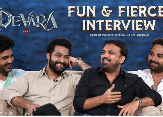 The highly anticipated movie Devara has generated a great deal of buzz, and fans are eager to dive deeper into the behind-the-scenes magic. In a candid interview, NTR, Koratala Siva, and others reveal their experiences, excitement, and the challenges they faced while working on this massive cinematic venture. This article unpacks some of the key highlights from their discussion and gives insight into what makes Devara a movie to watch out for. Confidently Nervous: NTR's Perspective on the Anticipation of 'Devara' Starting off with a blend of excitement and nerves, NTR opened up about the emotional rollercoaster of launching such a big movie. "I’m confidently nervous," he admitted, expressing his anticipation. While he’s confident in the film's potential, there’s always that lingering nervousness before release. NTR explains that it’s not just about delivering another hit but ensuring that the movie's message resonates with the audience. "People have no clue what's coming their way," he adds, emphasizing the effort put into the movie. With its unique narrative and action-packed scenes, Devara promises to deliver an experience that will take viewers by surprise. A New Kind of Protagonist: Breaking Traditional Stereotypes One of the standout points Siddhu Jonnalagadda touched on is the film’s approach to portraying the protagonist. Typically, mainstream commercial movies showcase the hero as someone who instills confidence and courage in others, especially those who are downtrodden. However, Devara flips this trope on its head. In the movie, a protagonist with an abundance of courage reaches a point where even fearless individuals start feeling the weight of responsibility. "There should always be a healthy respect for fear," says Siddhu. He elaborates that fear is not always a negative emotion but can act as a guide for responsibility. It's a refreshing take that adds depth to the movie's action sequences and emotional layers. Koratala Siva's Signature Subtlety: Injecting Messages Without Preaching Devara director Koratala Siva is known for incorporating societal messages into his films without making them feel overly preachy. In this interview, Siva shared that while he feels a strong sense of responsibility toward society, his challenge lies in keeping the message subtle and integrated into the storyline. When asked about this approach, Siva said, "It becomes preachy sometimes, but that’s where the challenge lies — to deliver a message without making it feel like a sermon." His ability to blend intense action scenes with thoughtful commentary is one of the reasons why Devara is expected to stand out in a sea of commercial films. Aggression and Emotion: The Core of 'Devara' In the trailer, NTR’s character appears more aggressive than usual. The intense emotions running through the character arc demand a portrayal that is raw and visceral. "Fear, emotion, aggression—everything needs to be louder," says NTR. He explains that for this character to evoke fear in others, there needs to be a perfect balance of intimidation and emotional depth. This balance is reflected in both the action sequences and the narrative, as the film is driven by high-intensity moments that demand both physical and emotional prowess from the cast. A Visual Spectacle: Testosterone-Fueled Action The action scenes in Devara promise to be a visual treat for audiences. With meticulously choreographed fight scenes and a backdrop of intense drama, the movie offers high-stakes action. "There’s going to be a lot of testosterone in this film," quips NTR. The film takes the action to the next level, merging intense combat with an equally gripping storyline. It's not just about random fight sequences but battles that drive the plot forward, making every punch, kick, and confrontation significant. Janhvi Kapoor's Phenomenal Performance One of the highlights of the interview was the discussion around Janhvi Kapoor’s performance in the film. While many were curious about how she would hold up in such a high-octane film, Siva and NTR were full of praise for her dedication and talent. Janhvi’s portrayal of her character, especially in a challenging scene that required a lengthy dialogue, left the crew speechless. "She delivered a two-page dialogue in one go," NTR said, reflecting on how impressed they were with her commitment to the role. Despite being hospitalized before the shoot, Janhvi showed up and gave her best, proving she’s more than capable of handling such a demanding role. Behind the Scenes Challenges: Shooting 'Devara' Was No Easy Feat As with any big-budget movie, Devara had its fair share of production challenges. Koratala Siva revealed that the team faced logistical difficulties, especially during a water sequence, which required the perfect balance between safety and creativity. "We had to ensure everything was just right—the water waves, the actors’ comfort, and of course, safety," he explained. This dedication to perfection speaks volumes about the level of detail the team has put into making Devara a cinematic spectacle. Another challenge that stood out was a scene that required multiple retakes, something that tested both the cast and crew’s patience. Yet, the determination to get the perfect shot never wavered, highlighting the film's commitment to delivering nothing but the best. Conclusion: Why 'Devara' Is a Must-Watch The interview with the Devara team gave fans a glimpse into the hard work, dedication, and creativity that went into making this film. With its unique narrative, intense action, and emotional depth, Devara promises to be a cinematic experience that goes beyond just entertainment. From NTR’s portrayal of a protagonist who redefines courage, to Janhvi Kapoor’s standout performance, Devara brings together a talented cast and a visionary director. With Koratala Siva at the helm, the film blends commercial success with meaningful storytelling, ensuring that it appeals to both mass audiences and critical viewers alike. Devara isn’t just another movie; it’s a statement, a story that challenges traditional cinema while delivering a gripping, action-packed narrative that will leave audiences wanting more.