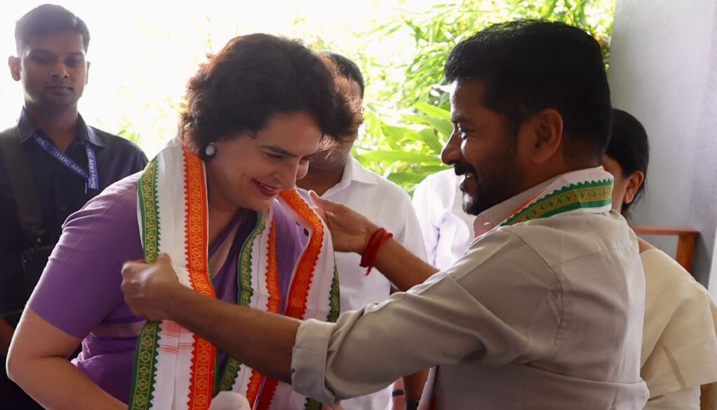Congress general secretary Priyanka Gandhi Vadra made a grand entry into Wayanad, marking her debut electoral battle for the upcoming Lok Sabha by-election. In a show of strength, Priyanka led a massive roadshow alongside her brother, Rahul Gandhi, and other top Congress leaders before filing her nomination at the Wayanad collectorate. This event underscored the strong familial and political ties between Wayanad and the Gandhi family, further solidifying Congress's position in the district. Priyanka Gandhi's First Electoral Battle Priyanka Gandhi is no stranger to political campaigns, having supported her family in various elections over the years. However, this by-election in Wayanad marks her first official candidacy. Speaking at a massive rally, Priyanka reflected on her 35 years of political experience, beginning with her first campaign for her father, Rajiv Gandhi, in 1989. "This is the first time I am campaigning for myself," she told the energized crowd, signaling a new chapter in her political journey. The by-election was necessitated by Rahul Gandhi's decision to vacate the Wayanad seat, which he held from 2019 to 2024, to focus on his Rae Bareli constituency. Rahul, now serving as the Leader of Opposition in Lok Sabha, stood by his sister as she embarked on this important step in her career. A Family Affair: Rahul and Sonia Gandhi’s Support Priyanka’s nomination was not just a personal milestone but a significant event for the Congress party. She was accompanied by her brother, Rahul Gandhi, her mother Sonia Gandhi, Congress president Mallikarjun Kharge, and other senior leaders. Their presence underscored the importance of Wayanad to the Gandhi family and the Congress party. Addressing the crowd, Rahul Gandhi emphasized the deep connection he shares with Wayanad. He thanked the people of the hill district for standing by him when "the whole world had turned its back" on him, particularly during challenging political times. Rahul went on to urge the people of Wayanad to take care of his sister in the same way they had supported him. "She will be your voice, and I know she will not let you down," he said. Priyanka Gandhi’s Message of Gratitude and Commitment Priyanka Gandhi’s speech was filled with gratitude for the people of Wayanad and a promise to continue the legacy of her brother's work. She highlighted her family's long-standing relationship with the district, reminding the audience of the support they gave Rahul during his term as MP. "My whole family will always remain indebted to you and grateful for this support," Priyanka said passionately, adding that she will work to strengthen the bond between the Gandhi family and Wayanad. She also recalled her visit to Wayanad during the tragic landslides that devastated the region, where over 200 lives were lost. Priyanka praised the courage and resilience of the local people, saying, "Your courage deeply touched me. It would be an honor to be part of your community." A Strong Stand Against BJP and National Unity In her address, Priyanka took aim at the current BJP government, accusing them of undermining democracy and dividing the nation. "They do not hesitate to subvert democracy. This is not the politics on which our nation was founded," she said, highlighting the ideological divide between Congress and the ruling party. Priyanka emphasized the importance of unity, love, and equality, values she believes are integral to India's foundation, regardless of religious beliefs. She further reiterated that the teachings of religious texts such as the Bible, Gita, and Quran promote unity, humility, and love, contrasting sharply with the divisive tactics she attributes to the BJP government. Congress’s Prominent Leaders Stand Together Priyanka’s roadshow in Wayanad was attended by numerous Congress stalwarts, including Karnataka Chief Minister Siddaramaiah and Telangana Chief Minister A. Revanth Reddy. Their presence, along with other senior leaders, showcased the party’s solidarity and the significance of Priyanka’s candidacy. Kharge, speaking at the event, encouraged the people of Wayanad to support Priyanka, emphasizing her dedication and commitment to representing the region. "She is not here just to file her nomination but to fight for the people of Wayanad," Kharge said. Rahul Gandhi's Emotional Plea for His Sister In a heartfelt moment, Rahul Gandhi made a personal plea to the people of Wayanad to care for his sister. He revealed the significance of the rakhi his sister tied on him, which he wears until it breaks. "It is a symbol of a brother's protection to his sister. Just as you protected me, I ask you to protect her," he said, highlighting their deep bond and mutual respect. Rahul also expressed his continued commitment to Wayanad, saying that while Priyanka would be the official MP, he would remain an "unofficial" MP for the constituency, ensuring that the district has double representation in Parliament. A Warm Reception for Priyanka in Wayanad Priyanka Gandhi received a hero’s welcome upon her arrival in Wayanad. Thousands of supporters lined the streets, holding balloons and flags representing Congress and its ally, the Indian Union Muslim League (IUML). The 2-kilometer-long roadshow route was filled with party supporters, eager to greet Priyanka and show their solidarity. Accompanying Priyanka were her husband, Robert Vadra, and her son, who joined the procession in an open-roof vehicle, adding a personal touch to the political spectacle. Conclusion: A New Era for Wayanad and Congress Priyanka Gandhi's nomination marks a significant moment in Indian politics and the Congress party's efforts to re-establish its dominance in key regions. With the support of her family and Congress leadership, Priyanka is poised to strengthen the party's connection to Wayanad, while promising to work tirelessly for the people of the district. As the by-election approaches, all eyes will be on Wayanad as Priyanka Gandhi embarks on this new chapter, aiming to carry forward the legacy of her family and continue Rahul Gandhi’s unfinished work in the constituency.