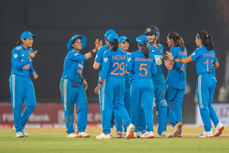 Radha Yadav Shines as India Triumphs Over New Zealand in 59-Run Victory in First Women’s ODI In an exciting start to the three-match ODI series, India secured a decisive 59-run victory over New Zealand in the first Women’s ODI held in Ahmedabad. A brilliant performance by India's bowling unit, led by the outstanding Radha Yadav, helped India defend a modest total of 227, bowling New Zealand out for 168 in 40.4 overs. With this win, India now leads the series 1-0, setting the tone for the matches ahead. India Takes Early Control with Key Wickets India's bowling attack wasted no time in putting New Zealand under pressure. The debutant pacer, Saima Thakor, made an immediate impact by striking with just her second delivery in international cricket, dismissing the experienced Suzie Bates. Bates edged an away-swinger, and wicketkeeper Yastika Bhatia made no mistake in completing the catch. This early dismissal set the stage for a dominant performance by India's bowlers. New Zealand struggled to find momentum, and by the time they reached 79 runs, they had already lost four key wickets. One of the most crucial and bizarre moments of the match came with the dismissal of captain Sophie Devine. In a moment of lapse, Devine failed to ground her foot behind the crease after stumper Yastika Bhatia quickly whipped off the bails following a throw from Deepti Sharma. This unusual dismissal further tilted the match in India's favor. Radha Yadav's Masterclass in Spin Bowling Radha Yadav was the star performer in India's bowling attack, demonstrating why she is regarded as one of the top spinners in women’s cricket. Yadav took three crucial wickets, her tight line and variations keeping the New Zealand batters guessing throughout their chase. Her relentless accuracy played a significant role in keeping the opposition under constant pressure, making it difficult for them to form meaningful partnerships. Her contribution, combined with the solid support from the other bowlers, particularly debutant Saima Thakor, who claimed two wickets, left New Zealand’s batting order in disarray. Thakor’s debut performance added a new dimension to India’s bowling, giving the team the breakthrough they needed at crucial junctures. Middle-Order Resistance from New Zealand While New Zealand's top order faltered, there was a brief glimpse of resistance from their middle-order batters. The fifth-wicket partnership between Brooke Halliday and Maddy Green, worth 49 runs, was the most substantial stand of the innings. This partnership briefly raised New Zealand's hopes of a comeback, but the required run rate kept mounting, and the Indian bowlers didn’t let up the pressure. Amelia Kerr showed great determination with an unbeaten 25 from the No.9 position, but without significant support from her teammates, New Zealand's chances faded quickly. Despite Kerr's efforts, New Zealand's innings folded for 168, falling well short of the target. Redemption for India After World Cup Defeat This victory was particularly satisfying for India, as it came on the heels of a recent setback against New Zealand. In the 2024 T20 World Cup group stage, Sophie Devine’s New Zealand team had outplayed India, securing a 58-run win, which ultimately propelled New Zealand to their first-ever T20 World Cup title. India's win in this ODI series opener served as a form of redemption, showcasing their ability to bounce back and compete at the highest level. India’s Balanced Approach with Both Bat and Ball Though India’s total of 227 may not have been overly imposing, the team’s balanced approach with both bat and ball proved to be the key to their success. The spinners, particularly Radha Yadav and Deepti Sharma, played a pivotal role in stifling New Zealand’s chase on a slow Ahmedabad pitch, where run-making wasn’t easy. The Indian team showed resilience in their bowling attack, making the most of the pitch conditions. Their disciplined bowling, combined with sharp fielding, left no room for New Zealand’s batters to recover after early setbacks. Radha Yadav’s three-wicket haul was the highlight of the match, but it was the collective effort of the entire bowling unit that ultimately sealed the win. Looking Ahead: India’s Strong Start to the Series With this emphatic win, India has laid down a strong marker in the series, taking a 1-0 lead with two more games to go. The team will be eager to carry this momentum forward and clinch the series in the upcoming matches. New Zealand, on the other hand, will look to regroup and come back stronger, hoping to level the series and keep their hopes alive. As the series progresses, all eyes will be on India’s bowling attack, particularly Radha Yadav, who continues to prove her mettle as a match-winning bowler. Her performance in the first ODI has not only boosted India’s chances in this series but has also reaffirmed her position as one of the finest spinners in the game today.