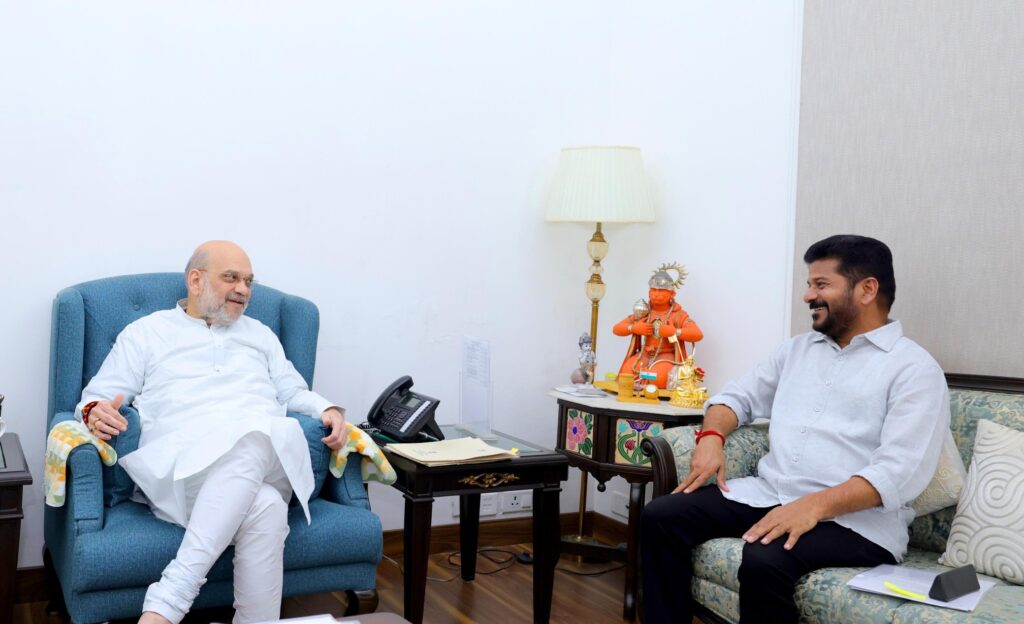 Telangana's Chief Minister, Revanth Reddy, has called upon Union Home Minister Amit Shah to assist in resolving the long-standing bifurcation issues between Telangana and Andhra Pradesh. In a recent meeting, CM Reddy highlighted the need for cooperation in addressing disputes related to the distribution of government buildings and public corporations, particularly under Schedule Nine and Schedule Ten of the Andhra Pradesh Reorganization Act, 2014. This appeal comes amid ongoing disagreements over the ownership of properties and institutions that were not clearly defined during the bifurcation process. Appeal for Fair Resolution of Schedule Nine and Ten Disputes Revanth Reddy has urged the Union Home Minister to help settle disputes over the distribution of government assets, as outlined in Schedule Nine (under Sections 53, 68, and 71 of the Act) and Schedule Ten (under Section 75 of the Act). The CM emphasized the need for a fair and amicable resolution, given the complexities arising from Andhra Pradesh’s claim to certain properties and institutions that were not explicitly mentioned in the Andhra Pradesh Reorganization Act. He called for Amit Shah’s intervention to ensure justice for Telangana in this matter. Telangana's Struggle for Justice in Property Distribution One of the most significant challenges that Telangana faces is the claim by Andhra Pradesh over properties and institutions not listed in the original bifurcation agreement. CM Reddy pointed out that these disputes are hindering Telangana's administrative and developmental progress. He requested that the Union Government act as a mediator to bring about a fair distribution of these assets, which are vital for the state's functioning and growth. The CM stressed the importance of settling these issues as soon as possible to allow both states to move forward without lingering disputes. Request for Additional IPS Officers In addition to the bifurcation-related issues, CM Revanth Reddy also urged Amit Shah to consider increasing the number of Indian Police Service (IPS) officers allocated to Telangana. At present, Telangana has only 76 IPS officers, a figure that was determined at the time of the state’s formation. The CM requested an additional 29 IPS officers, noting that the state’s growing population and administrative needs require more officers to maintain law and order effectively. Justification for More IPS Officers CM Reddy explained that the current number of IPS officers is insufficient to handle the law enforcement demands of a rapidly developing state like Telangana. Since its formation in 2014, Telangana has witnessed significant growth in both population and infrastructure, leading to an increased need for a stronger and more efficient police force. By allocating more IPS officers, the state can better manage its security challenges and ensure the safety of its citizens. Appeal for a Review of IPS Cadre Allotment During the meeting, CM Revanth Reddy appealed to the Union Home Minister to conduct a review of the current allotment of IPS cadre officers to Telangana. He stressed that the state's administrative structure has evolved since its bifurcation, and the current number of officers does not reflect the state's present needs. A review, according to the CM, would provide an opportunity to address the shortage and ensure that the state's police force is adequately staffed to meet future demands. Key Figures Present at the Meeting The meeting with Amit Shah saw the participation of several key figures from Telangana’s political and administrative circles. Nalgonda MP Raghuveer Reddy, Special Representative of the Telangana Government in Delhi AP Jitender Reddy, Chief Secretary Santhi Kumari, Principal Secretary to the Chief Minister Seshadri, and Director General of Police (DGP) Jitender were all present at the discussions. Their presence underscored the seriousness of the issues being addressed and the state’s commitment to finding a resolution. The Path Forward for Telangana Telangana’s unresolved bifurcation issues continue to be a source of tension between the state and Andhra Pradesh. However, with the intervention of the central government, there is hope for a solution that will be fair to both parties. CM Revanth Reddy’s meeting with Amit Shah represents a significant step towards addressing these long-standing disputes. Additionally, the request for more IPS officers highlights the state’s proactive approach to ensuring that its administrative and security needs are met. As Telangana continues to grow, it will require not only a fair distribution of assets but also an adequately staffed police force to maintain peace and order. The central government's role in resolving these issues will be crucial for the state’s future development and stability.