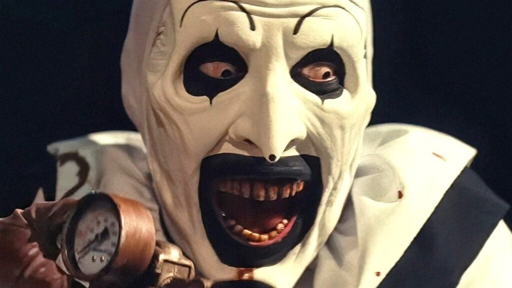 Terrifier 3 made waves on October 29, 2024, as it soared past the $50 million mark in worldwide box office earnings. Directed by Damien Leone, this third installment in the Terrifier horror franchise not only marks a commercial victory but has also shattered the record for the highest-grossing unrated film in history. The film’s blend of horror and dark comedy continues to capture a global audience, establishing it as a standout in the horror genre. Box Office Breakdown and Financial Success As of the latest figures, Terrifier 3 has achieved an impressive global total of $51.27 million. The majority of these earnings come from domestic theaters, where it brought in approximately $44.5 million, while international markets added around $10.6 million. Released on October 11, 2024, the film’s opening weekend set a strong precedent, raking in $18.9 million. With a production budget of just $2 million, the film's extraordinary financial performance underscores the power of low-budget horror films driven by a passionate fan base and clever marketing strategies. Previously, the record for the highest-grossing unrated film was held by Renaissance: A Film by Beyoncé, which garnered $43 million worldwide. Terrifier 3 has now set a new benchmark in the genre, surpassing expectations and redefining what’s possible for unrated films at the box office. Positive Audience Reception for Terrifier 3