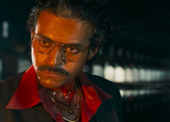 Overview of the Matka Movie Plot and Location Touted as a period drama by its makers, Telugu movie Matka directed by Karuna Kumar treads on the world of gambling and the concept of power. Although in its marketing material it claims to emulate that high time of cinema of late 1950s to early 1980s but rather unfortunately the period drama has pegged its narrative to the height of mediocracy as a simple crime drama. While Varun Tej (who plays ‘Vasu’) is depicted based on an actual person called Ratan Khatri or the ‘Matka King,’ it also glorifies the dark side of the industry of illegal gambling such as its intricacies and hazards, the movie tries too much to advertise gambling. Desperate times led Varun across to the harsh environment of Matka but the film does not settle well with the rest of the actors especially due to weak plot and screenplay. Story Foundation: The Ascent of Vasu as well as the Origins of Matka The character of Vasu, shaped by Ratan Khatri, reflects the complexities of a gambler who has to traverse his way through the maze of illegal betting. Khatri was the first person to popularise the matka betting concept which was fused into a gambling medium that initially originated from the trading of cotton and later turned out to become an important part in Indian economy during the 1970’s. In this case, Karuna Kumar twists the road map of the character from that of a Mumbaikar to a native of Visakhapatnam in order to suit the Telugu film industry. Vasu in Varun Tej’s eyes, a young man who is trying to strike a balance between his existence and the highlife, has a prominent role in the story but the plot, however, does not do much to make his character progress from being a common gambler to an iconic and notorious character. A Predictable Rags-to-Riches Experience CBI officer, played by Naveen Chandra, recounts Vasu’s journey of deception to eventually rising to the top of the underworld in Matka. The portrayal of Vasu as a refugee in the 1950s Burma sung by Kishor Kumar’s black and white cinematography gives depth to the plot. He is seen progressing in life due to his harsh conditions as a child in a juvenile home and being impoverished. These events in a noticeable way are the foundation upon which his later ambitions and picks stand, but the rest of the movie still follows a predictable storyline like it is bound on rails. Supporting Characters: Allies, Enemies And Sequence Breaks Matka is no different as Vasu also meets many of such characters who appear to be an impediment or a progression for him through the film. As Vasu goes through more intense events, the love scene is acted out by Meenakshi Chaudhary as Sujatha, Vasu’s love interest, who performed well despite having less time on-screen. Vasu's feeling is shown by the movie’s romance scenes but the regret in this is that the time used for these was used instead to showing him gambling, a stark contrast on how the character should have been presented. Other supporting characters such as Satyam Rajesh and Ajay Ghosh and John Vijay had minor roles that offered nothing memorable; thus, leaving the audience wishing for more from these alliances and conflicts. When it comes to the underbelly of Visakhapatnam, both politics and crime seem to source out in every attempt one makes to understand it. The film industry has never been scarred by the presence of crime onscreen, in fact Matka seems highly promising and tantalizing due to the political power struggles that the inhabitants of Visakhapatnam tackled whilst coming into the criminal underworld. When trying to sell the film, the creators decided to use ‘a boy from the streets’ trope instead which is devoid of any depth but rather offers the audience a fluff piece that is entertaining as well as fails to offer an insight into the tectonic shift in crime and politics that transpired around the city of Visakhapatnam. This trend seems to not only be inflicted on the people but is apparent in the history of India as well as events like the Emergency and demonetization are treated as mere talking points. Speaking of opportunity, Varun Tej has plenty as he seems to have great command with the part of Vasu. Tej devotes himself to this role, emphasizing Vasu’s awkwardness and later putting on a show of utter confidence, resulting in a tremendous first impression. The tenderness and warmth of Tej Vasus’s eyes captures the stillness and quietness of mind even at its most troubled moments before suddenly exploding out due to external conflicts. However, the idea of him evolving into a more menacing version of himself does not sit comfortably with Rohit. Even though the situation demands one, an attempt by Tej to put on an alluring charm or even a menacing air is limited by the writing. Music, Cinematic Artistry, and the Last Thoughts Matka aospreys itself to tambaram thanks to the Gv prakash kumars music, but unfortunately the richness that is intended is deeply lacking in the film as the songs never seem to fit in the narrative, instead at times throw the tempo of the film off balance. On the other hand, the cinematography by Kishor Kumar is able to create an aura by using retro visuals and imagery which helps in knitted viewers to a different time period. Despite this, the narrative is full of good opportunities that were squandered, the pre climax and climax, and plot twists and character revelations were all unsurprising, therefore the pathos of the film did not have the desired magnitude. For the followers of crime drama and biographies, Matka makes them feel as if they are watching a half-baked version of a very popular genre. Conclusion: A captivating story with an attempt to be creative but fell flat Matka, while trying to tell the morally ambiguous story of an Indian Gambler does not push to deliver something that is remarkable or worth its meaning. Despite the films great set pieces and period accuracy or even Varun Tej's honest performance, it is held back by a poorly written plot and poorly developed characters. Matka will be disappointing to most who wish to watch gripping and cerebral crime films as the film fails to go beyond the very basic and shallow aspects of the genre.