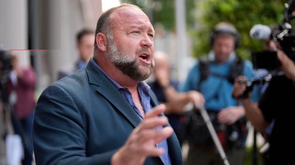 The Onion Secures Infowars in Bankruptcy Sale, Transforming Alex Jones's Site into Satire The popular satirical news outlet, The Onion, recently made headlines by winning the bid to acquire Infowars, the infamous platform led by conspiracy theorist Alex Jones. This purchase, made through a bankruptcy auction, has garnered attention as The Onion plans to turn Infowars into a parody of its former self. However, shortly after the deal was announced, the bankruptcy court intervened, placing a temporary hold on the transaction. A hearing is scheduled for next week to address the sale. Backed by Sandy Hook Families: A Symbolic Acquisition The Onion’s bid was not only a business move but also an act of solidarity with the families affected by the Sandy Hook Elementary School tragedy. In 2022, these families won a historic $1.4 billion defamation lawsuit against Alex Jones for his claims that the massacre was a hoax. Their backing of The Onion’s bid demonstrates support for using satire to challenge harmful conspiracy theories. Ben Collins, CEO of The Onion’s parent company Global Tetrahedron, expressed the company’s intention to relaunch Infowars as a platform that will mock the misinformation industry and highlight the absurdities behind various conspiracy theories. Collins shared in an interview that this acquisition will allow The Onion to bring humor to a domain typically known for promoting divisive and unproven ideas. “The families saw this as a powerful prank,” Collins noted, explaining that they believe it’s essential to counteract harmful narratives through humor and satire. In January, Infowars is expected to be reintroduced with a satirical twist, poking fun at internet personalities who capitalize on misinformation and endorse dubious health products. Infowars’ Shift from Conspiracy to Comedy The winning bid marks a striking transformation for Infowars, which has, for years, been a prominent platform for conspiracy theories and misinformation. Known for promoting alternative narratives and controversial viewpoints, Alex Jones built Infowars into a hub for those skeptical of mainstream media. Under The Onion’s direction, Infowars will turn from a promoter of conspiracy to a humorous takedown of conspiracy culture. The relaunch will target figures like Jones himself, as well as others who exploit audiences for financial gain by promoting unverified and sensational claims. Jones, however, has already voiced his concerns. Lawyers representing Jones and an affiliated company that offered $3.5 million for the website have challenged the validity of the auction process. This has led the court to question the bidding and hold a hearing to determine the outcome. What the Acquisition Includes The Onion’s winning bid encompasses all major assets related to Infowars, including its website, social media accounts, Austin, Texas-based studio, trademarks, video archive, and more. Almost immediately following the announcement, Infowars went offline, and Jones began broadcasting from a new location. If the acquisition proceeds, The Onion will own Infowars’ digital presence, providing the satirical publication with a platform to deliver its signature humor to a new audience. The Onion views this purchase as part of a broader mission to hold alternative media and internet influencers accountable for spreading misinformation. Collins emphasized that Infowars’ new direction will go beyond just Jones, targeting other figures in the misinformation landscape. “There’s a whole world of podcasters and social media influencers spreading questionable narratives,” Collins said, acknowledging the immense followings many of these personalities have built. Satire with a Purpose: Holding Alternative Media Accountable