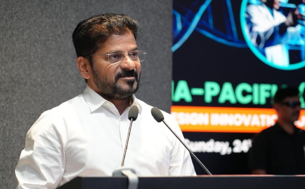 Hyderabad surges forward as a powerhouse in biotechnology, pharmaceuticals, and medical technology, transforming from a traditional manufacturing base into a vibrant center of cutting-edge innovation. Chief Minister A. Revanth Reddy actively champions this shift, emphasizing Telangana's commitment to fostering groundbreaking advancements in healthcare. During his address at the BioDesign Innovation Summit hosted by AIG Hospitals, he outlined a vision where the state partners closely with innovators to tackle India's pressing medical challenges. This evolution positions Hyderabad not just as a regional leader but as a global destination for life sciences excellence, drawing investments, talent, and partnerships from around the world. In this dynamic landscape, Hyderabad combines world-class academic institutions, a highly skilled workforce, and robust industry collaborations to drive progress. The Chief Minister highlights how the city now channels its intellectual resources inward, solving local healthcare issues rather than solely exporting solutions abroad. With government-backed initiatives, access to vast medical datasets under stringent privacy measures, and a focus on indigenous innovation, Hyderabad stands ready to redefine the future of biotech, pharma, and MedTech. This article explores the key drivers behind this rise, from pioneering methodologies like BioDesign to massive infrastructure projects and ambitious economic targets. The Evolution of Hyderabad's Life Sciences Ecosystem Hyderabad actively builds on its rich history to emerge as one of Asia's premier life sciences hubs. Once known primarily as India's "pharmacy of the world," the city now innovates across biotech, pharma, and MedTech sectors, thanks to strategic developments like Genome Valley. This 2,000-acre cluster outside Hyderabad hosts over 200 companies from 18 countries, including six of the world's top 10 research and development firms. Genome Valley serves as the epicenter for scaling up biopharma operations, with companies like Bharat Biotech launching advanced facilities for cell and gene therapy production, backed by multimillion-dollar investments. The ecosystem's growth traces back to deliberate policies that attract global players. For instance, Amgen invested $200 million in a new technology and innovation site in Hyderabad, creating thousands of jobs and focusing on bioinformatics and AI-driven drug discovery. Similarly, Eli Lilly established a high-tech pharma facility, emphasizing manufacturing excellence in biotechnology. These moves underscore Hyderabad's appeal: a blend of cost-effective operations, skilled talent from institutions like the Indian Institute of Chemical Technology, and supportive government incentives. Startups and established firms alike thrive here. The city's life sciences sector secured over $4 billion in investments from more than 140 projects in recent years, generating tens of thousands of jobs. Events like BioAsia 2025 further cement this status, uniting innovators in life sciences and health tech to explore healthcare's future. Hyderabad's transformation reflects a broader Indian ambition to shift from generic drug production to innovative therapies, addressing global demands in personalized medicine and digital health. This evolution also integrates advanced technologies. Companies in Hyderabad develop bioinformatics platforms that analyze massive genomic datasets, crucial for next-generation treatments. The city's role as a vaccine hub, exemplified by Bharat Biotech's contributions during global health crises, highlights its manufacturing prowess. As Hyderabad expands, it positions itself alongside top global biotech hubs like Boston or San Francisco, but with a unique focus on affordable, scalable solutions for emerging markets. Government Initiatives and Support for Biotech, Pharma, and MedTech Innovation The Telangana government actively propels Hyderabad's innovation agenda through targeted policies and partnerships. Chief Minister Revanth Reddy pledges comprehensive support for medical product development, positioning the state as a key collaborator in BioDesign-led research. At the APAC BioDesign Innovation Summit 2025, he announced access to historical medical data for researchers, ensuring compliance with rigorous privacy standards to fuel data-driven breakthroughs. This proactive stance aligns with Telangana's economic vision: achieving a $1 trillion economy by 2034 and scaling to $3 trillion by 2047. To realize this, the government invests in infrastructure, incentives, and skill development. The new Life Sciences Policy aims to make Hyderabad one of the world's most vibrant biosciences ecosystems, attracting over ₹54,000 crore in investments since 2024. Initiatives like the Telangana MSME Policy 2024 focus on life sciences and pharma, contributing significantly to India's industry revenue. The state boasts over 20 incubators dedicated to MedTech and life sciences, fostering R&D in AI, genomics, and digital health. Programs such as "Invent in Telangana" encourage innovation, powering the trillion-dollar goal by 2035. Moreover, regulatory reforms address bottlenecks, with AI-powered approvals streamlining processes for biotech firms. The government collaborates with global entities, ensuring Hyderabad remains competitive. These efforts not only boost local employment but also position Telangana as a leader in sustainable healthcare innovation, tackling issues like affordable diagnostics and personalized treatments. Spotlight on Key Players: AIG Hospitals and Dr. Nageshwar Reddy's Contributions AIG Hospitals leads Hyderabad's MedTech revolution under the visionary guidance of Dr. D. Nageshwar Reddy. As Chairman, Dr. Reddy pioneers BioDesign methodologies that identify unmet clinical needs, validate solutions, and scale manufacturing. His work extends beyond device creation, integrating AI and advanced endoscopy to transform patient care. Honored with the Padma Vibhushan in 2025—the first Indian doctor to receive all three Padma awards—Dr. Reddy's contributions span global endoscopy advancements and healthcare collaborations. At AIG, he hosts events like the Artificial Intelligence in Healthcare Summit, where experts discuss AI's role in diagnosis and treatment. His international engagements, including meetings with Nobel laureates, pave the way for cutting-edge research partnerships. AIG Hospitals itself innovates relentlessly, from AI-driven platforms to MedTech solutions addressing gastrointestinal issues. The APAC BioDesign Innovation Summit 2025, graced by Chief Minister Revanth Reddy, showcases these efforts, bringing together Asia-Pacific leaders to accelerate healthcare innovation. Dr. Reddy's emphasis on indigenous solutions inspires a new generation of innovators, making AIG a cornerstone of Hyderabad's ecosystem. Through these initiatives, AIG and Dr. Reddy not only advance MedTech but also mentor startups, ensuring knowledge transfer and collaborative growth. Their work exemplifies how individual leadership drives collective progress in biotech and pharma. The Medical Devices Park at Sultanpur: A Catalyst for MedTech Growth India's largest dedicated Medical Devices Park at Sultanpur propels Hyderabad's MedTech sector forward. This sprawling facility hosts over 60 global and domestic companies, focusing on diagnostics, imaging, implants, surgical equipment, and digital health. With investments exceeding ₹1,500 crore, the park generates over 7,000 direct jobs and supports R&D, prototyping, testing, and manufacturing. Companies like Sahajanand Medical Technologies invest ₹250 crore in vascular device facilities, creating hundreds of skilled positions. Others, including Promea Therapeutics and Huwel Life Sciences, contribute to a cumulative ₹265 crore influx, producing world-class products for global markets. The park's infrastructure includes advanced testing labs, aiding firms in compliance and innovation. Launched in 2017, Sultanpur has attracted 50+ companies, with commitments for further expansion. EMPE Diagnostics, for example, invested ₹25 crore in R&D for molecular diagnostics. This cluster not only boosts exports but also addresses domestic needs, like affordable surgical tools. The park's success stems from government facilitation, including land allocation and incentives. It integrates with nearby residential developments, enhancing local economies. As MedTech demand grows—India's sector eyes $30 billion by 2030—Sultanpur positions Hyderabad as a manufacturing powerhouse. Thriving Startups and MSMEs in Hyderabad's Biotech and Pharma Scene Hyderabad's startups and MSMEs invigorate the life sciences ecosystem, turning ideas into impactful solutions. Top emerging biotech firms like those in Genome Valley reshape India's landscape with global ambitions. Companies such as SAI Life Sciences and Skyroot Aerospace (venturing into biotech applications) exemplify this vibrancy. The Telangana MSME Policy supports these entities, earmarking zones in industrial corridors for growth. Over 1,000 life sciences companies operate here, backed by incubators like CIIC, focusing on Industry 4.0 and mobility in biotech. Startups benefit from a network of 20+ innovation centers, receiving funding and mentorship. Notable players include Bharat Biotech, expanding into CGT with $75 million facilities. MSMEs like those in the Medical Devices Park produce diagnostics and oculoplasty tools, creating thousands of jobs. The ecosystem's strength lies in collaboration, with events like India Pharma Expo 2026 fostering B2B connections. Despite challenges like funding gaps, Hyderabad's startups turn corners by leveraging local talent and global partnerships, contributing to a $126,450 crore sector output. This entrepreneurial spirit drives innovation in AI-health tech, projected to reach $504 billion globally by 2025. Attracting Global Investments and Partnerships in Life Sciences Hyderabad draws massive global investments, solidifying its status as a life sciences manufacturing hub. Firms like Bristol Myers Squibb and Amgen establish innovation centers, with BMS's site becoming its largest outside the US by 2025. Amgen's $200 million hub focuses on AI and biotech, expected to add 2,000 jobs. The city's appeal includes four of the top 10 global innovators—Novartis, BMS, Sanofi, and Roche—operating directly here. Recent influxes, such as MSD's investments, strengthen R&D in biotech. BioAsia 2025 highlighted these partnerships, showcasing Hyderabad's role in global pharma. Government efforts, including the new policy, aim to cement Telangana's global leadership. With over ₹25,000 crore invested in life sciences in recent years, Hyderabad offers world-class infrastructure and talent pools. These investments not only fuel growth but also enable knowledge exchange, accelerating innovations in drug discovery and MedTech. Future Prospects: Towards a Trillion-Dollar Economy in Biotech and Beyond Telangana charts an ambitious path to a $3 trillion economy by 2047, with biotech, pharma, and MedTech as key pillars. Chief Minister Revanth Reddy's "Telangana Rising 2047" plan targets $1 trillion by 2034 through sustained 10% annual growth. This aligns with India's $35 trillion national goal, emphasizing fiscal discipline and innovation. Hyderabad's life sciences will drive this, with projections for massive job creation and tech integration. Challenges like regulatory hurdles require reforms, but opportunities in AI and gene therapy abound. By 2030, India's MedTech sector could hit $30 billion, with Hyderabad leading. Challenges and Opportunities in Hyderabad's Innovation Landscape While Hyderabad thrives, it faces hurdles like talent retention and regulatory complexities. Startups often struggle with funding, yet India's ecosystem ranks third globally with over 100 unicorns. Opportunities arise from global demand for affordable innovations, with health tech booming. Addressing these, Telangana invests in skill programs and partnerships, turning challenges into growth drivers. Hyderabad's Global Impact on Biotech, Pharma, and MedTech Hyderabad revolutionizes global healthcare through innovation and collaboration. As it aims for trillion-dollar milestones, the city inspires worldwide, blending tradition with futuristic tech to improve lives everywhere.