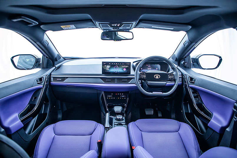 Interior dashboard and front seats of Tata Nexon showcasing modern design and features