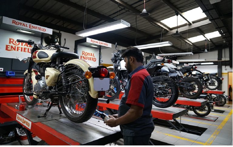 Royal Enfield Motorcycles Now Available on Flipkart: Revolutionary E-commerce Partnership Transforms Indian Motorcycle Buying Experience Royal Enfield has achieved a groundbreaking milestone in India's motorcycle industry by becoming the first mid-size motorcycle brand to sell its complete 350cc portfolio through e-commerce giant Flipkart. This strategic partnership, launched on September 22, 2025, represents a revolutionary shift in how premium motorcycles reach digital-first customers across five major Indian metropolitan cities. The collaboration coincides perfectly with the implementation of GST 2.0 reforms that reduced taxation on motorcycles under 350cc from 28% to 18%, resulting in price reductions of up to ₹22,000 across Royal Enfield's popular 350cc range. This dual advantage of digital accessibility and significant cost savings positions Royal Enfield at the forefront of India's evolving automotive retail landscape. Royal Enfield 350cc Price Reductions After GST Cut - September 2025 Digital Transformation: Royal Enfield's Strategic Entry into E-commerce Partnership Details and Market Positioning Royal Enfield's collaboration with Flipkart marks a paradigm shift in motorcycle retailing, making premium motorcycles accessible with just a few clicks. B. Govindarajan, Managing Director of Eicher Motors Ltd. and CEO of Royal Enfield, emphasized that this partnership enables the brand to "meet today's digital-first customers where they are, requiring a simple, convenient way to explore and purchase their motorcycles online". The initiative launches initially in five strategically selected metropolitan areas: Bengaluru, Gurugram, Kolkata, Lucknow, and Mumbai. These cities represent key markets with high digital adoption rates and substantial motorcycle demand, providing an ideal testing ground for Royal Enfield's e-commerce strategy. Map of India showing major cities including Bangalore, Kolkata, Lucknow, and Mumbai highlighted as key markets for Royal Enfield bikes on Flipkart Complete 350cc Portfolio Availability The entire Royal Enfield 350cc lineup becomes available through Flipkart, including the Hunter 350, Classic 350, Bullet 350, Meteor 350, and the recently launched Goan Classic 350. This comprehensive approach ensures that customers have access to the brand's complete mid-size motorcycle range, catering to diverse preferences from urban commuting to long-distance touring. Each model features Royal Enfield's advanced 349cc J-series engine, delivering 20.2 bhp and 27 Nm of torque through a smooth 5-speed transmission. This consistent powerplant ensures reliability and performance across the entire 350cc range while maintaining the characteristic Royal Enfield riding experience. GST 2.0 Impact: Significant Price Reductions Across 350cc Range Comprehensive Price Restructuring The implementation of GST 2.0 has created substantial benefits for Royal Enfield customers, with the company passing on the complete tax reduction directly to consumers. The entry-level Hunter 350 now starts at ₹1.37 lakh for the Factory variant, representing a decrease of ₹12,260 from its previous pricing. The Classic 350, one of Royal Enfield's best-selling models, has received price reductions ranging from ₹16,000 to ₹19,000 across different variants. The base Redditch SC variant now costs ₹1.81 lakh, while the premium Emerald Green variant is priced at ₹2.15 lakh, making these iconic motorcycles significantly more accessible to Indian consumers. Market Impact and Consumer Benefits Royal Enfield's decision to implement full GST benefit transfer demonstrates the brand's commitment to customer value. The Meteor 350 cruiser series has become more affordable by ₹17,000 to ₹19,000 across its Fireball, Stellar, Aurora, and Supernova variants, with prices starting at ₹1.91 lakh. The recently launched Goan Classic 350 has also benefited from the GST reduction, with variants like Purple Haze and Shack Black priced at ₹2.17 lakh, representing reductions of nearly ₹19,500. These price adjustments make Royal Enfield motorcycles competitive against both domestic and international brands while maintaining their premium positioning. Customer Experience: Seamless Integration of Digital and Physical Services Omnichannel Approach to Motorcycle Sales Royal Enfield has designed its e-commerce strategy to maintain the personal touch that defines the brand experience. While customers can browse, configure, and purchase motorcycles online through Flipkart, the final delivery and after-sales support are managed by the customer's preferred Royal Enfield authorized dealer in their respective cities. This hybrid approach ensures that customers receive the convenience of online shopping combined with the personalized service and expertise of local dealerships. The strategy maintains Royal Enfield's reputation for quality customer service while embracing digital transformation trends. Flexible Payment Options and Benefits Customers purchasing Royal Enfield motorcycles through Flipkart gain access to various flexible payment methods, including no-cost EMI options and bank offers. The timing of the launch with Flipkart's Big Billion Days Sale provides additional value through promotional discounts and exclusive deals. The integration with Flipkart's payment infrastructure enables customers to leverage credit facilities and installment plans, making premium motorcycles more accessible to younger demographics and first-time buyers. This financial flexibility aligns with Royal Enfield's goal of expanding its customer base while maintaining brand prestige. Royal Enfield motorcycle dealership showcasing multiple models in front of a well-lit showroom in India Target Market Analysis: Reaching Digital-First Customers Demographic Insights and Consumer Behavior Royal Enfield's e-commerce initiative specifically targets India's growing population of digital-first consumers, particularly young professionals aged 20-35 years. Research indicates that this demographic represents approximately 35% of Royal Enfield's customer base, making them a crucial segment for digital engagement strategies. Royal Enfield Customer Demographics and Market Segmentation - 2025 The brand's customer segmentation reveals a diverse mix of adventure enthusiasts (25%), middle-income urban riders (20%), brand loyalists and collectors (15%), and first-time motorcycle buyers (5%). This varied demographic profile necessitates a multichannel approach that combines digital convenience with traditional dealership experiences. Urban Market Penetration Strategy The selection of Bengaluru, Gurugram, Kolkata, Lucknow, and Mumbai as initial launch cities reflects Royal Enfield's strategic focus on high-potential urban markets. These metropolitan areas demonstrate strong digital adoption rates, higher disposable incomes, and established motorcycle cultures that align with Royal Enfield's brand positioning. India's premium motorcycle market has shown remarkable growth, with volumes climbing from 19 lakh units in FY19 to 23 lakh units in FY25. The market share of premium motorcycles (above 150cc) has increased from 14% to 19% during the same period, indicating strong consumer appetite for higher-capacity motorcycles. Industry Context: E-commerce Evolution in Indian Automotive Sector Changing Consumer Preferences The Indian two-wheeler industry is experiencing significant premiumization, with consumers increasingly preferring motorcycles with higher engine capacities and advanced features. This trend aligns perfectly with Royal Enfield's product portfolio and positioning as a premium motorcycle manufacturer. Royal Enfield's e-commerce entry comes at a time when India's overall motorcycle market reached 19.6 million units in FY25, comparable to pre-COVID levels. The brand has demonstrated exceptional growth, with sales exceeding one million units in the last fiscal year, representing a 16.8% increase. Digital Transformation Trends The partnership with Flipkart reflects broader digital transformation trends across India's automotive sector. E-commerce platforms are becoming increasingly important for reaching younger consumers who prefer online research and purchasing over traditional dealership visits. Royal Enfield has invested significantly in digital marketing and customer relationship management, utilizing AI-driven personalization to improve customer engagement rates by 100%. The brand's digital ecosystem has grown substantially, building a community of 7.8 million loyalists and making it India's second-most engaging brand. Competitive Landscape and Market Implications First-Mover Advantage in Premium Segment Royal Enfield's initiative represents the first time a mid-size motorcycle brand in India has offered direct e-commerce sales of an entire portfolio. This first-mover advantage positions the company ahead of competitors in embracing digital transformation and meeting evolving customer expectations. The strategic timing with GST benefits and Flipkart's Big Billion Days Sale creates a compelling value proposition for customers. The combination of convenience, competitive pricing, and brand prestige offers significant competitive advantages in India's crowded motorcycle market. Impact on Traditional Dealership Models The hybrid approach adopted by Royal Enfield demonstrates how traditional automotive retail can evolve without completely displacing existing dealership networks. By maintaining dealer involvement in delivery and after-sales service, the company preserves valuable customer relationships while expanding digital reach. This model could serve as a template for other premium motorcycle manufacturers looking to embrace e-commerce without alienating their dealer partners. The success of this initiative may influence broader industry adoption of similar hybrid retail strategies. Future Expansion and Growth Prospects Planned Market Expansion Royal Enfield has indicated plans to expand the e-commerce initiative to additional cities beyond the initial five metropolitan markets. This phased expansion approach allows the company to refine its digital processes and customer experience before scaling nationwide. Royal Enfield motorcycles undergoing maintenance in an authorized showroom service area in India The brand's strong performance in FY25, with record sales and market share gains, provides a solid foundation for digital expansion. The success of the Flipkart partnership could accelerate Royal Enfield's plans for broader e-commerce adoption across India. Illustration of Flipkart logo surrounded by digital devices and books symbolizing online shopping variety on the platform Technology Integration and Innovation Royal Enfield's digital transformation extends beyond basic e-commerce functionality to include advanced features like 3D configurators and personalized customer experiences. The brand has developed India's first 3D online motorcycle configurator, allowing customers to customize their bikes before purchase. Royal Enfield motorcycle dealership with multiple bike models displayed outside a modern glass-front showroom in India The integration of AI-powered recommendations and predictive analytics helps Royal Enfield deliver personalized content and product suggestions to individual customers. This technological sophistication enhances the online shopping experience and builds stronger customer relationships. Conclusion: Pioneering the Future of Motorcycle Retail Royal Enfield's partnership with Flipkart represents a watershed moment in Indian motorcycle retail, successfully combining digital innovation with traditional service excellence. The initiative addresses the evolving needs of digital-first customers while maintaining the personal touch that defines the Royal Enfield ownership experience. The strategic timing with GST 2.0 benefits creates unprecedented value for customers, making premium motorcycles more accessible than ever before. The comprehensive approach, covering the entire 350cc portfolio across five major cities, demonstrates Royal Enfield's commitment to digital transformation without compromising brand values. As India's motorcycle market continues evolving toward premiumization and digital adoption, Royal Enfield's e-commerce initiative positions the brand at the forefront of industry transformation. The success of this partnership could influence broader automotive retail strategies and accelerate the adoption of hybrid online-offline purchasing models across the Indian automotive sector. This groundbreaking initiative reinforces Royal Enfield's position as not just a motorcycle manufacturer, but as an innovative lifestyle brand that adapts to changing consumer preferences while preserving its rich heritage and authentic riding culture. The combination of digital accessibility, competitive pricing, and unwavering quality standards creates a compelling proposition for India's next generation of motorcycle enthusiasts.