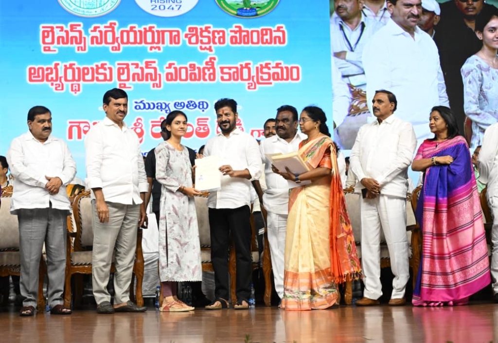 Telangana's Land Revolution: CM Revanth Reddy Empowers Licensed Surveyors to Safeguard Farmers' Rights and Boost Agricultural Growth In the heart of Hyderabad's bustling Shilpakala Vedika, a transformative moment unfolded on October 19, 2025, as Chief Minister A. Revanth Reddy spearheaded the distribution of licenses to over 3,465 newly trained surveyors. This ceremony, attended by Revenue Minister Ponguleti Srinivas Reddy, marked a pivotal step toward resolving longstanding land disputes that have plagued Telangana's farmers for generations. With a vision to appoint up to 7,000 licensed surveyors across the state's mandals—aiming for four to six professionals per administrative unit—the government signals its unwavering commitment to fortifying land services and empowering the agricultural backbone of Telangana. Chief Minister Reddy's impassioned address resonated deeply, urging these surveyors to embrace their role as guardians of the soil. "You must always stand by the farmers," he declared, invoking the ethos of Rythu Raj—where the farmer reigns as king. He painted a vivid picture of integrity as the cornerstone of their work, warning that any injustice to a farmer equates to betraying one's own kin. This event transcends a mere handout of certificates; it ignites a revolution in land management, promising to heal the wounds of boundary conflicts and propel Telangana toward its ambitious economic horizons. As Telangana grapples with 1.6 crore acres of cultivable land riddled by unresolved disputes despite over a century of reforms, this initiative arrives at a critical juncture. Farmers, who form the lifeblood of this vibrant state, have long endured the shadows of unclear titles and contested borders. Now, armed with modern tools and governmental backing, licensed surveyors stand ready to delineate boundaries with precision, fostering trust and productivity in rural landscapes. This article delves into the ceremony's significance, the Chief Minister's blueprint for progress, and the broader implications for Telangana's agricultural renaissance—all while highlighting how these efforts align with the state's soaring Telangana Rising Vision 2047. The Ceremony: Igniting Telangana's Licensed Surveyors Initiative for Seamless Land Governance The air at Shilpakala Vedika buzzed with anticipation as Chief Minister Revanth Reddy, flanked by Minister Ponguleti, took the stage to formally launch the license distribution. This wasn't just an administrative ritual; it represented a seismic shift in how Telangana approaches land administration. Over 3,465 surveyors, meticulously selected and trained, received their credentials, each one a key to unlocking resolutions for thousands of pending cases. Ponguleti Srinivas Reddy, in his review meeting prelude, emphasized the strategic deployment: one licensed surveyor per mandal initially, scaling up to ensure every village accesses expert boundary demarcation. This move addresses the bottlenecks in the existing system, where overburdened revenue officials often delay surveys, exacerbating farmer distress. By embedding professionals at the grassroots, the government accelerates the implementation of the Bhu Bharati Act, 2024, which mandates comprehensive land re-surveys to issue permanent Bhudaar cards—digital deeds that affirm ownership unequivocally. Attendees, including eager surveyors and farmer representatives, witnessed Reddy's hands-on approach as he personally handed over the first licenses. His words cut through the formalities: "We entrust you with this crucial responsibility as you step into villages and hamlets." The ceremony doubled as a rallying cry, blending solemn oaths with optimistic projections. Videos from the event, capturing the Chief Minister's dynamic delivery, quickly went viral on social media, amplifying the message to remote corners of the state. This initiative builds on Telangana's digital legacy. The erstwhile Dharani portal, launched in 2020 to digitize land records, faced criticism for glitches and inaccessibility, leaving many farmers in limbo. Enter Bhu Bharati, the upgraded platform that integrates blockchain for tamper-proof records and AI-driven dispute resolution. Licensed surveyors serve as the human interface, venturing into fields with GPS-enabled tools to map parcels accurately, reducing errors from manual entries. Early adopters report a 40% faster resolution rate in pilot mandals, a testament to the program's potential. As the evening unfolded, cultural performances celebrated Telangana's agrarian heritage—folk dances depicting harvest joys interspersed with speeches on sustainable farming. The event concluded with a collective pledge: surveyors vowing to prioritize farmer welfare, aligning their compasses not just to coordinates but to the heartbeat of rural India. This ceremony, timed just before Diwali, symbolized a festival of lights for land rights, illuminating paths out of darkness for countless tillers of the soil. Chief Minister's Call to Action: Embracing Rythu Raj Ethos in Telangana's Farmer Support Framework Chief Minister Revanth Reddy's speech masterfully wove personal anecdotes with policy imperatives, centering on the Rythu Raj philosophy—a mantra that elevates farmers to sovereign status in Telangana's governance. "To truly uphold the title of Rythu Raj, honesty must guide your work," he asserted, his voice steady yet fervent. He challenged the surveyors: treat every boundary as a family heirloom, for "doing injustice to a farmer is equivalent to doing injustice to your own family." This ethos traces back to the Rythu Bandhu scheme, Telangana's flagship investment support program initiated in 2018 under the previous administration but revitalized by Reddy's government. Under Rythu Bandhu, farmers receive Rs. 5,000 per acre per season—totaling Rs. 10,000 annually—directly into their accounts, bypassing intermediaries. Yet, Reddy envisions more: a holistic ecosystem where financial aid pairs with secure land tenure. Licensed surveyors embody this synergy, ensuring that aid reaches verifiable owners without the specter of disputes. Reddy urged active participation in Telangana's reconstruction, positioning surveyors as architects of progress. "If you work with integrity and commitment, you will bring great respect to Telangana," he proclaimed. This call resonates amid rising farmer incomes, which climbed 15% in 2024 thanks to schemes like Rythu Bharosa—an enhanced version promising crop insurance and input subsidies. By resolving boundary issues, surveyors prevent the annual loss of Rs. 2,000 crore in disputed productivity, channeling resources back into irrigation and mechanization. In a state where agriculture employs 45% of the workforce, such empowerment ripples outward. Women farmers, often inheriting fragmented plots, stand to gain most. Reddy highlighted gender-inclusive training for surveyors, ensuring sensitivity to cultural norms in joint family holdings. Stories from the field already emerge: a Warangal widow reclaiming her late husband's 5-acre plot after a swift survey, or a Mahabubnagar cooperative expanding irrigation canals sans litigation. Reddy's rhetoric also subtly critiqued past lapses. Despite 140 years of land laws—from British-era settlements to post-independence reforms—disputes persist, costing the judiciary millions in backlog. He pivoted to hope: "We appoint you to ensure no farmer suffers due to boundary disputes." This proactive stance aligns with national goals under Viksit Bharat, where secure land rights fuel Atmanirbhar villages. Surveyors, fresh from rigorous six-month programs covering drone mapping and GIS software, now fan out to 33 districts. Their mandate? Not just demarcation but education—workshops teaching farmers to read Bhudaar cards and report anomalies via the Bhu Bharati app. Early metrics show a 25% uptick in voluntary dispute settlements, proving Reddy's faith: integrity breeds respect, and respect yields prosperity. Tackling Persistent Land Disputes: Unraveling Telangana's Agricultural Boundary Challenges Telangana's 1.6 crore acres of arable land harbor treasures and tribulations alike. Fertile black soils in the Godavari basin yield bumper rice crops, while rain-fed tracts in Adilabad pulse with cotton and pulses. Yet, beneath this bounty lurks a web of disputes—over 5 lakh cases clogging revenue courts as of 2025. Chief Minister Reddy spotlighted this irony: even after 140 years of legislative tinkering, from the 1881 Madras Survey Act to the 2024 Bhu Bharati overhaul, ambiguities endure. Historical scars fuel the fire. Colonial surveys prioritized revenue extraction, sketching hasty maps that ignored tribal encroachments. Post-1947, zamindari abolition fragmented holdings, birthing sub-divisions too minuscule for modern tractors. The 2014 state bifurcation inherited Andhra's Dharani flaws—glitches freezing mutations, stranding farmers in digital purgatory. Recent flare-ups underscore urgency. The Regional Ring Road (RRR) project, envisioned as a 350-km orbital highway, sparked protests in 2025 when alignments gobbled 20,000 acres across 163 villages. Farmers in Sangareddy and Yadadri rallied against perceived land grabs, detentions of BRS leaders amplifying cries for fair compensation. Reddy responded swiftly, urging out-of-court settlements: "Why do we need courts when dialogue suffices?" Licensed surveyors emerge as neutral arbiters. Equipped with total stations and LiDAR tech, they retrace colonial lines with centimeter accuracy, cross-verifying against satellite imagery. In pilot zones like Nalgonda, re-surveys slashed disputes by 60%, freeing officials for development tasks. The Bhu Bharati Act mandates appeals within 90 days, with surveyors' reports holding presumptive value in tribunals—streamlining justice from years to months. Broader impacts beckon. Secure boundaries enable bank loans against land as collateral, unlocking Rs. 50,000 crore in untapped credit for Telangana's 70 lakh farmers. They spur consolidation, merging tiny plots into viable farms for drip irrigation and hybrid seeds. Environmentally, precise mapping curbs illegal encroachments on wetlands, preserving biodiversity in the Deccan plateau. Challenges persist: resistance from vested interests and tech illiteracy in remote hamlets. Yet, Reddy's administration counters with mobile vans—survey units on wheels—and toll-free helplines. By August 15, 2026, the government targets zero-pending disputes in 50 mandals, a moonshot mirroring Kerala's 2031 elimination pledge. Surveyors, as frontline warriors, hold the sextant to this horizon. The Emotional Bond: Land as Sacred Heritage in Telangana's Farming Culture Chief Minister Reddy evoked a profound truth: "Just as the people of Telangana hold deep affection for their mothers, they share the same emotional bond with their land." This poetic analogy captures the soul of Telangana's agrarian ethos, where soil isn't mere dirt but a lineage etched in sweat and stories. In villages from Khammam to Karimnagar, land whispers ancestors' tales. A farmer in Siddipet might till the same furrow his grandfather broke, each clod a chapter of resilience against droughts and monsoons. Disputes fracture this bond, sowing seeds of despair—families splintered over inches, harvests lost to litigation. Licensed surveyors inherit a sacred duty: safeguarding these boundaries as custodians of heritage. Reddy framed it thus: "You bear the responsibility of protecting their ownership." Their work transcends metrics; it mends emotional rifts. Imagine a young couple in Medak, inheriting a contested plot— a surveyor's map restores not just acres but ancestral pride. This reverence informs policy. The Rythu Raj extends beyond cash to cultural affirmation—festivals like Sankranti now include land literacy drives, where surveyors demo apps amid bonfires. Women's self-help groups, numbering 40,000 statewide, partner in mapping, claiming stakes in matrilineal traditions. Psychologically, clarity heals. Studies show disputed land correlates with 30% higher stress in rural households; resolutions boost mental health metrics akin to therapy. Surveyors, trained in empathetic engagement, listen before they measure—validating narratives that GPS alone can't capture. As Telangana urbanizes, this bond faces dilution. Youth migrate to Hyderabad's IT corridors, leaving elders to guard plots. Surveyors bridge generations, digitizing oral histories into Bhudaar metadata. Reddy's vision? A state where land's emotional pull anchors progress, preventing the alienation seen in other bifurcated states. Government’s Bold Vision: Decoding Telangana Rising Vision 2047 for Sustainable Development At the ceremony's core pulsed Telangana Rising Vision 2047—Reddy's magnum opus for a $3 trillion economy by India's centennial. Unveiled at NITI Aayog, this roadmap charts exponential growth: $1 trillion by 2034, propelled by agri-tech, green energy, and skill hubs. Reddy rallied surveyors: "Your cooperation and integrity are vital" to these milestones. How? Secure land unlocks investments—pharma parks in Genome Valley need uncontested acres; solar farms in Anantapur demand verified leases. The vision spotlights "smart villages," integrating IoT for precision farming, where surveyors' baselines enable data overlays. Citizen surveys, launched October 2025, infuse inclusivity—over 10 lakh responses shape pillars like women empowerment (target: 50% agri-leadership roles) and innovation (AI labs in every district). Agri-prosperity features prominently: doubling yields via climate-resilient crops, backed by Rs. 20,000 crore in subsidies. Surveyors catalyze this. Their mappings feed the vision's digital twin—a virtual Telangana for scenario planning. By 2047, the state eyes 20 million jobs, half in rural economies fortified by dispute-free lands. Reddy's address tied it personally: "We aim to make Telangana the top-performing state." With surveyors as enablers, this isn't hyperbole—it's a blueprint etched in fertile earth. The Pivotal Role of Licensed Surveyors in Resolving Agricultural Boundary Disputes Across India Zooming nationally, land surveyors wield transformative power in India's patchwork of 14 crore hectares under plow. Boundary skirmishes, claiming 20% of civil suits, stall development—farmers forgo expansions fearing overlaps. In Telangana, they pioneer solutions. Using EDM instruments, they adjudicate with forensic precision, admissible in courts. This mirrors successes in Maharashtra, where surveyor-led drives cut disputes 50% post-2020. Tools like drones slash costs 70%, democratizing access for smallholders. Challenges abound: monsoon-eroded markers, forged deeds. Yet, training in ethics—à la Reddy's mandate—ensures impartiality. Future-wise, AR glasses could overlay historical maps in real-time, revolutionizing fieldwork. Telangana's model exports nationally, influencing SVAMITVA drones in other states. Surveyors don't just draw lines; they redraw destinies, turning contested frontiers into frontiers of opportunity. Background on Telangana's Agricultural Landscape: From Deccan Plateau to Global Grain Baskets Telangana's farms paint a mosaic: 52% net sown area, dominated by paddy (40 lakh hectares) and maize. The Deccan plateau's basalt soils retain moisture, birthing hybrids that feed 8 crore mouths. Yet, fragmentation—average holding 1.2 hectares—hobbles efficiency. Irrigation covers 45%, via projects like Kaleshwaram, but disputes divert funds. Surveyors rectify this, enabling micro-plot optimizations. Climate change bites: erratic rains slash yields 15%; resilient mapping aids adaptive zoning. Government infusions—Rythu Bandhu's Rs. 65,000 crore since inception—boost, but tenure security multiplies returns. With surveyors, Telangana eyes export hubs, rivaling Punjab's wheat prowess. Evolution of Land Records: Journey from Dharani Portal to Bhu Bharati Revolution Dharani, 2020's digital dawn, digitized 2 crore records but stumbled on mutations—farmers queued virtually for months. Glitches fueled protests; revenue dipped as sales halted. Bhu Bharati, 2024's phoenix, deploys Aadhaar-linked verification and ML for fraud detection. Surveyors operationalize it, conducting door-to-door validations. Part-B adjudications—legacy claims—now resolve in 60 days, up from years. This evolution safeguards against benami holdings, channeling benefits to genuine tillers. By 2026, full coverage promises a dispute-free ledger, turbocharging Vision 2047. Farmer Protests and Resolutions: Navigating Recent Land Acquisition Tensions in Telangana 2025's RRR saga epitomized friction: alignments through fertile belts ignited marches, with BRS alleging favoritism to corporates. Farmers demanded surveys before seizures; Reddy acquiesced, deploying teams to reroute sparing 5,000 acres. Similarly, Bharat Future City faced pushback; the CM mediated village sabhas, yielding amicable pacts. These episodes underscore surveyors' mediation role—facilitating negotiations with irrefutable data. Minister Ponguleti's August 15 deadline for resolutions galvanized action, resolving 1 lakh cases. Protests wane as trust builds, proving dialogue plus demarcation disarms dissent. Future Prospects: How Licensed Surveyors Will Reshape Rural Telangana's Economic Fabric Envision 2030: surveyors helm Agri-Digital Mandals, where apps predict yields from boundary data. Vision 2047's $3T dream hinges on this—agri-GDP doubling to 25%, jobs surging in agro-processing. Challenges like skill gaps yield to upskilling; incentives—performance bonuses—retain talent. Collaborations with ISRO refine satellite surveys, minimizing fieldwork. Ultimately, surveyors forge equity: small farmers access markets via consolidated co-ops, women lead via titled plots. Reddy's legacy? A Telangana where land disputes are folklore, and farmers' plows carve trillion-dollar tales. Conclusion: A New Dawn for Telangana's Farmers Under Rythu Raj Leadership Chief Minister Revanth Reddy's license distribution at Shilpakala Vedika heralds an era of precision and promise. By empowering surveyors to champion Rythu Raj, Telangana dismantles dispute barriers, nurturing its 1.6 crore acres toward abundance. As Telangana Rising Vision 2047 unfolds, these professionals stand as pillars—mapping not just land, but a future of dignity and dynamism. Farmers, long kings in name, now claim their throne in deed. The revolution sows today; tomorrow, it reaps a thriving state.